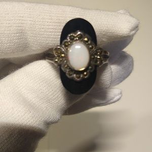 Opal, Silver, and black ring